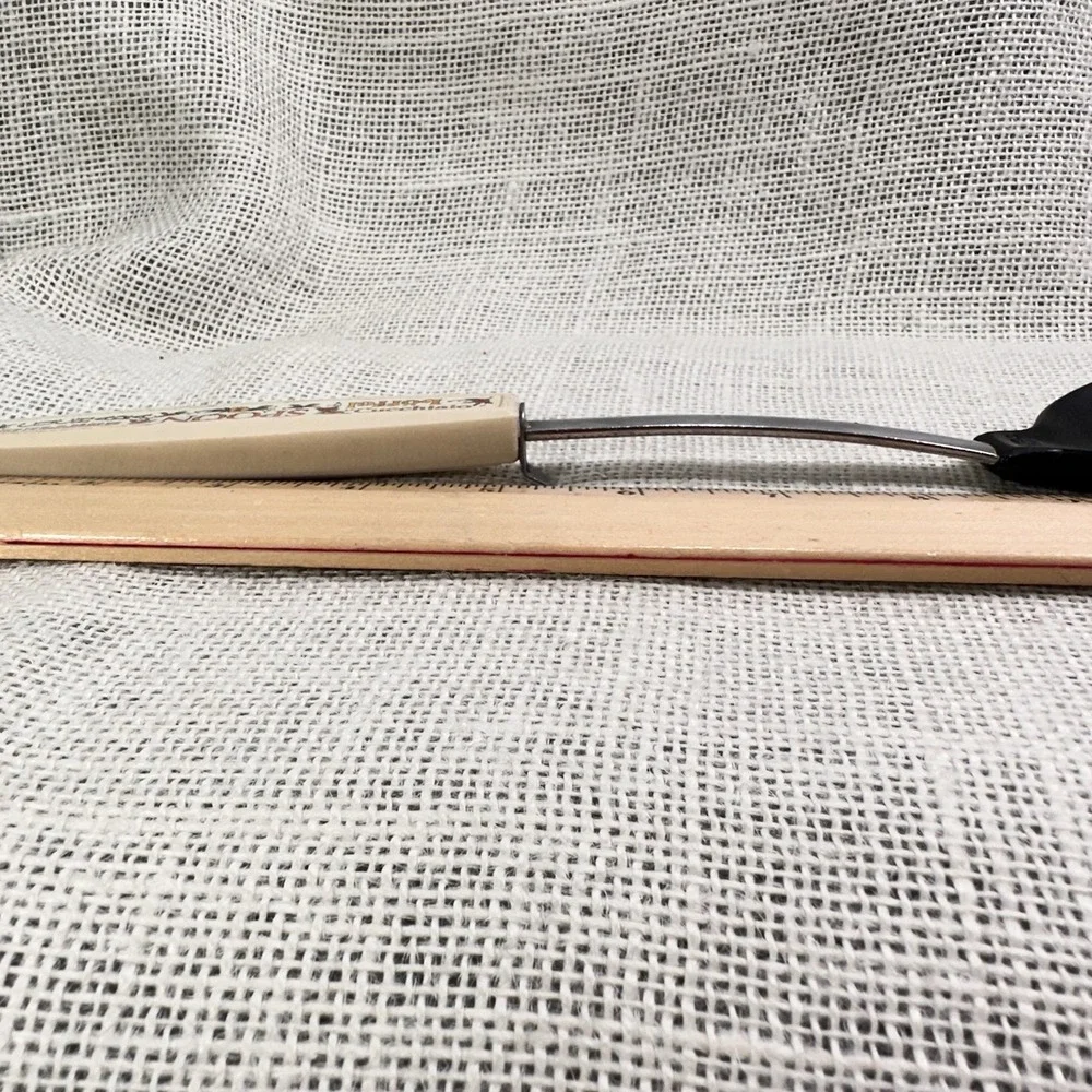 EKCO USA Slotted Spoon Floral Handle Multilingual 